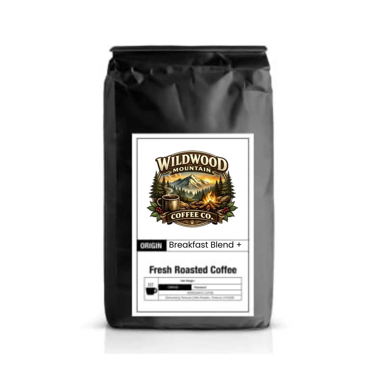 Black coffee bag with Wildwood Mountain Coffee Co. label on a white background