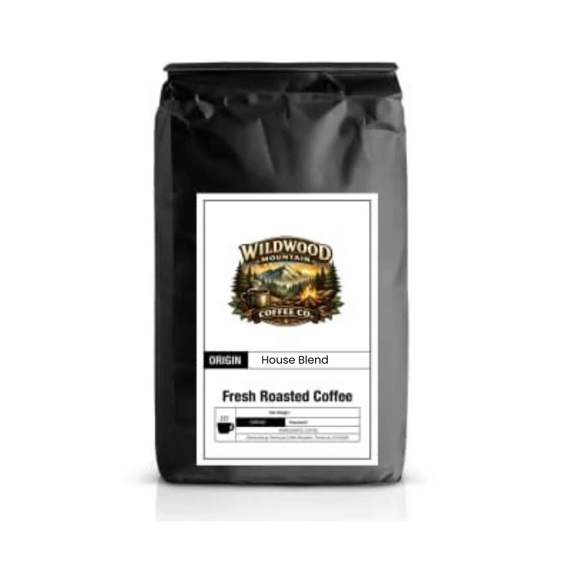 Black coffee bag with Wildwood Mountain Coffee Co. label on a white background