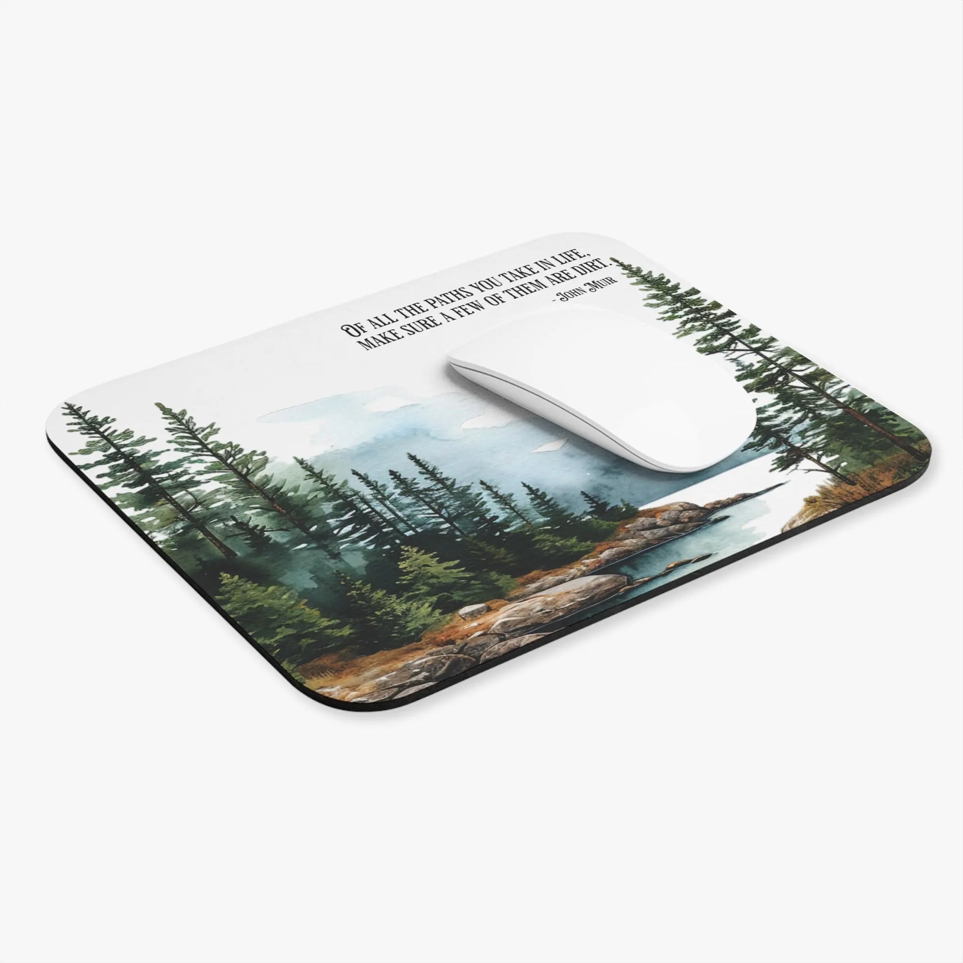 Mouse pad with nature design and motivational quote on a white background