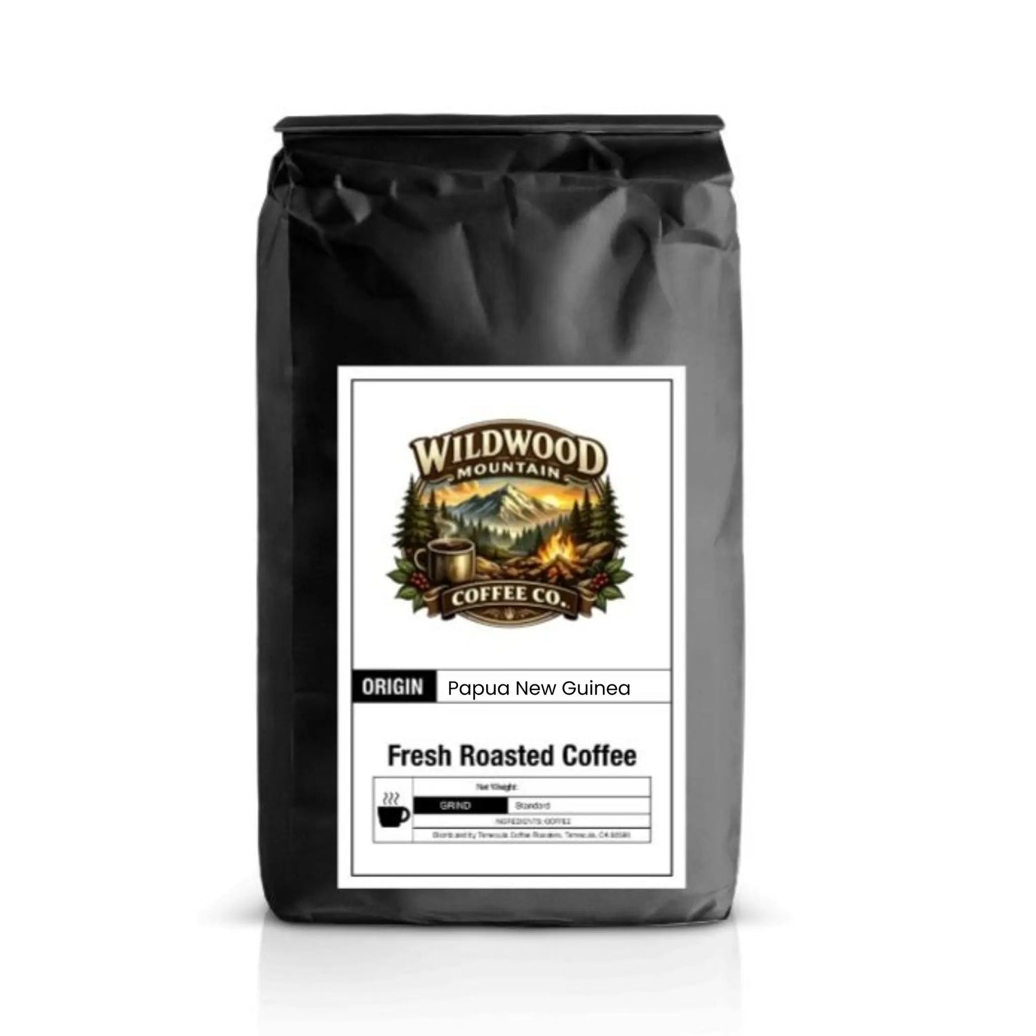 Black coffee bag with Wildwood Mountain Coffee Co. label on a white background
