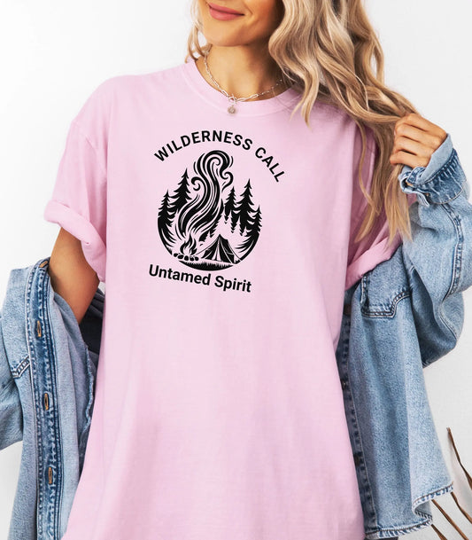 Person wearing a blossom t-shirt with 'Wilderness Call Untamed Spirit' design