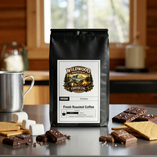 Wildwood Mountain Coffee Co. coffee bag with s'mores ingredients on a table.