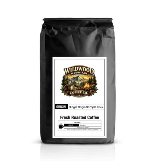 Black coffee bag with Wildwood Mountain Coffee Co. label on a white background