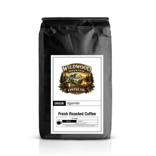 Black coffee bag with Wildwood Mountain Coffee Co. label on a white background