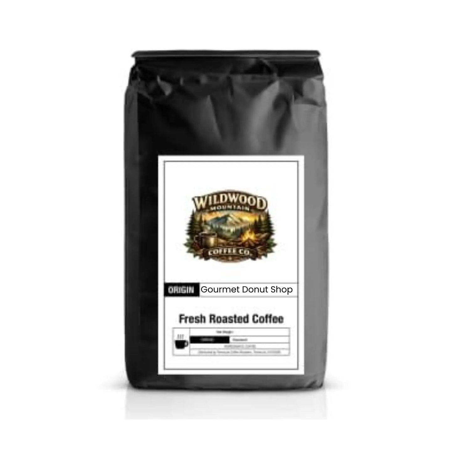 Black coffee bag with Wildwood Mountain Coffee Co. label on a white background